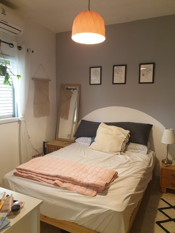Affordable Bedroom styling with grey backboard and painted headboard